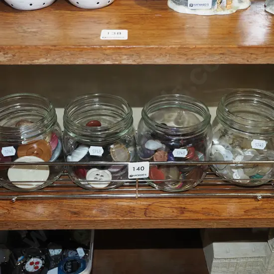 4x jars of buttons, metal rack