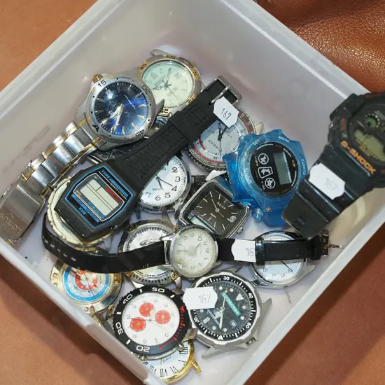 tub of watches and parts - as is no returns