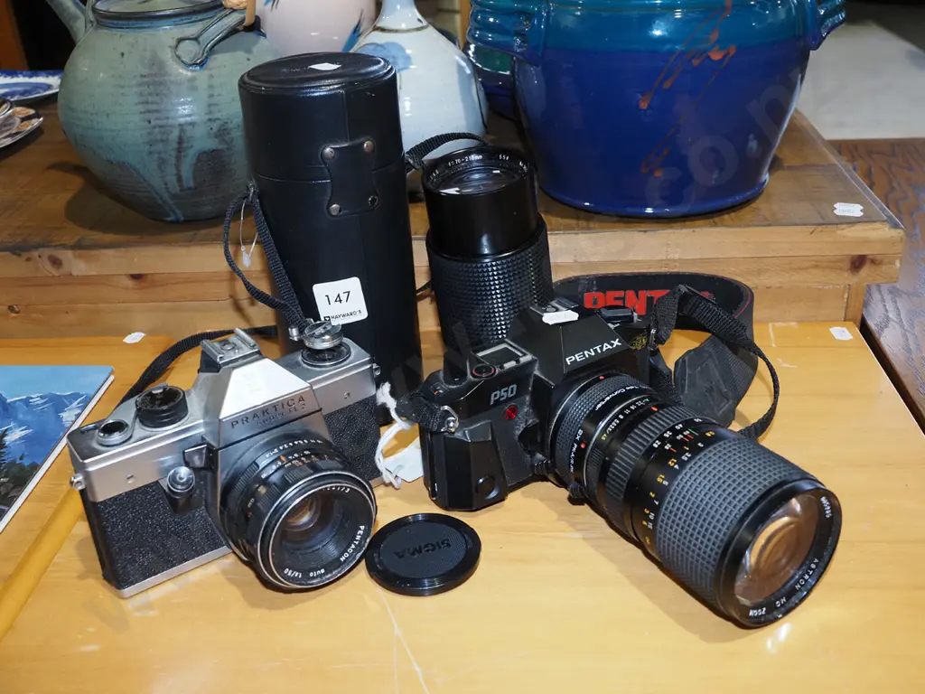 Praktica and Pentax 35mm cameras with lens and case Image 1++