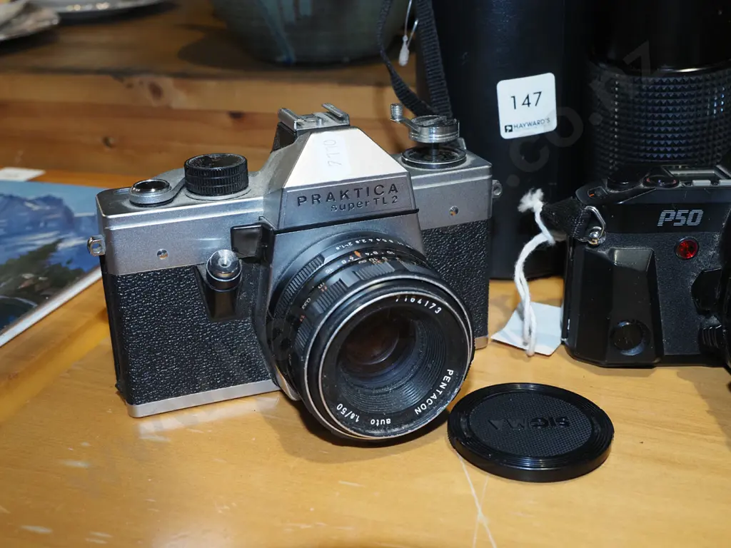 Praktica and Pentax 35mm cameras with lens and case Image 1++