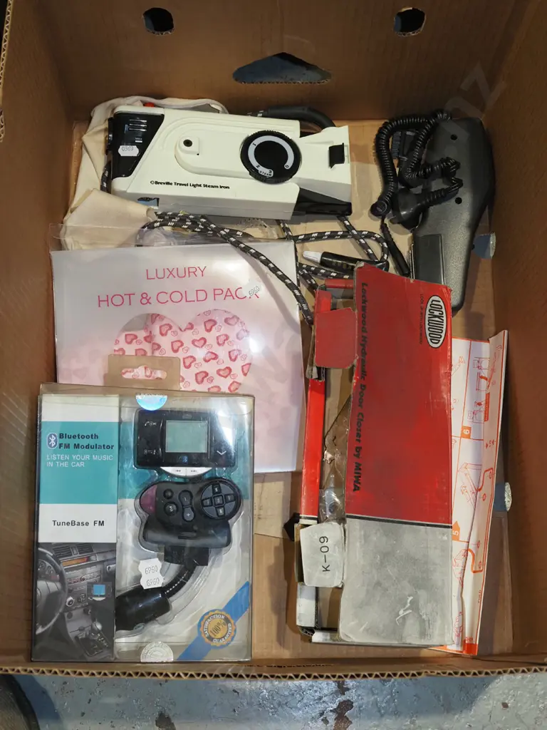 box; blue tooth FM modulator, travel iron, door hardware etc Image 1++