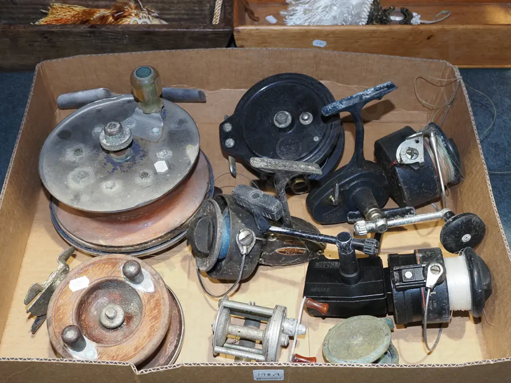 box of old fashioned reels in restorer's condition Image 1++