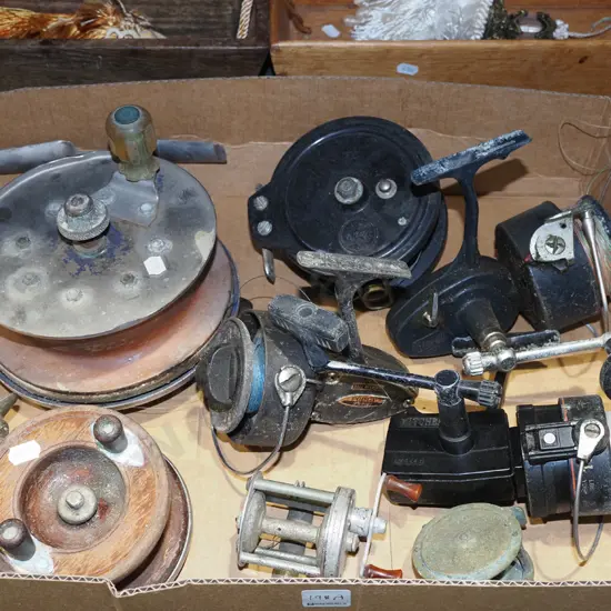 box of old fashioned reels in restorer's condition