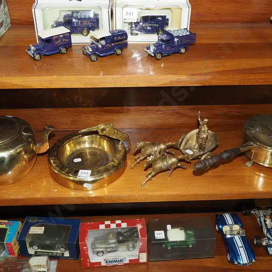 shelf of brass ware; teapot, ashtray etc