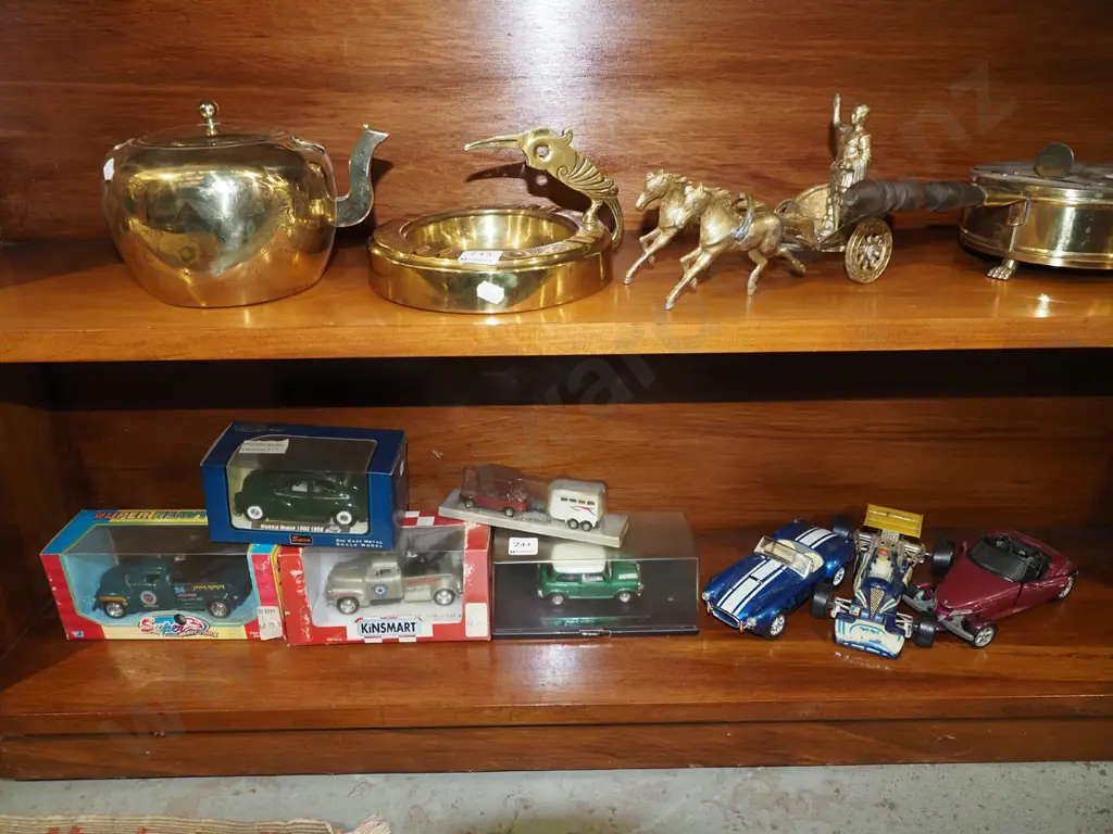 shelf of toy vehicles Image 1++