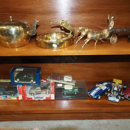 shelf of toy vehicles