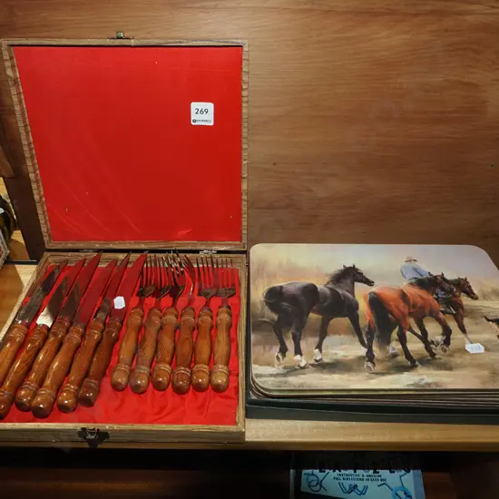 cased wooden handled steak knives and forks, farming scene placemats