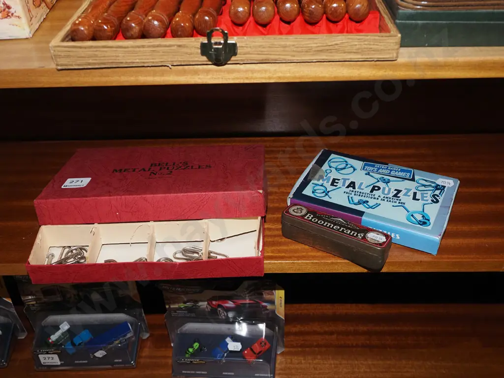 Boomerang harmonica and 2x boxes of metal puzzles Image 1++