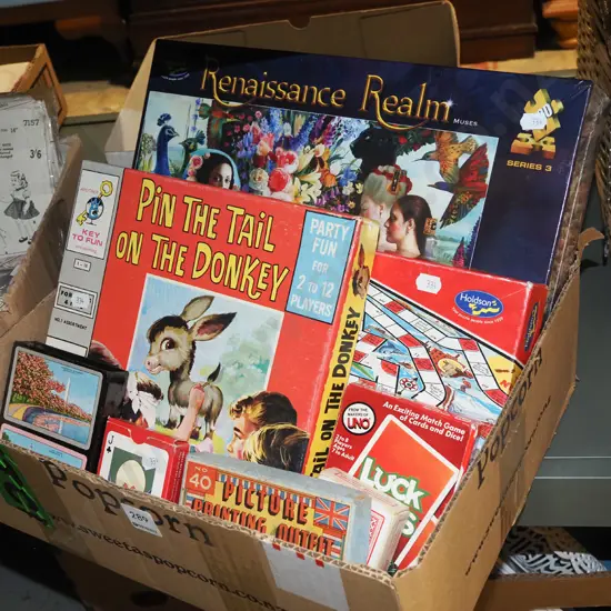 box; puzzles, board games, playing cards etc
