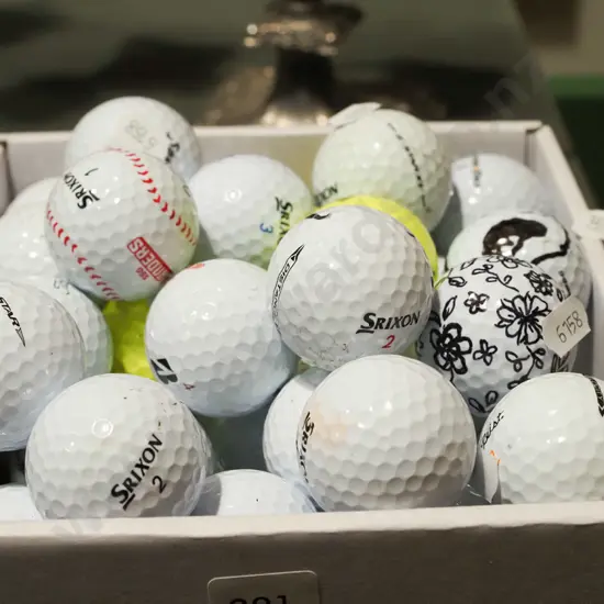 box of golf balls