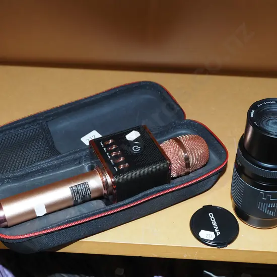 blue tooth microphone in case, 35mm camera lens