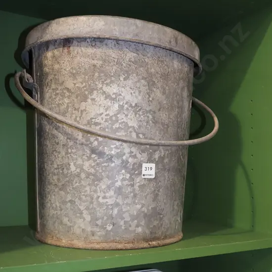 galvanised lidded ash can