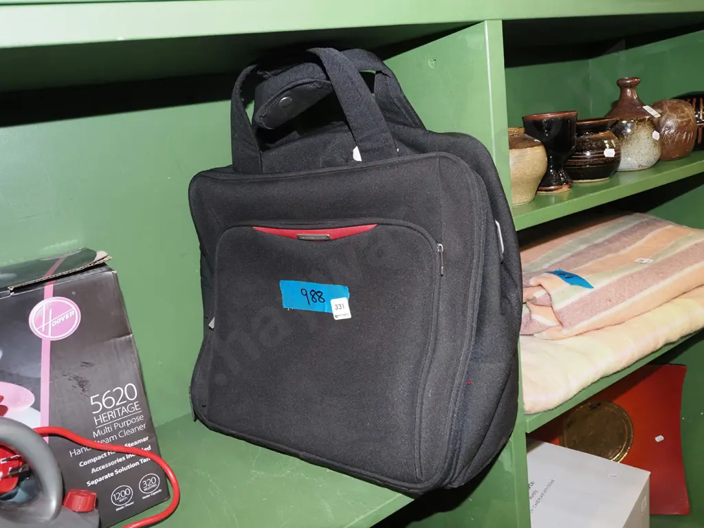 small computer bag/satchel with pull out handle and wheeels Image 1++
