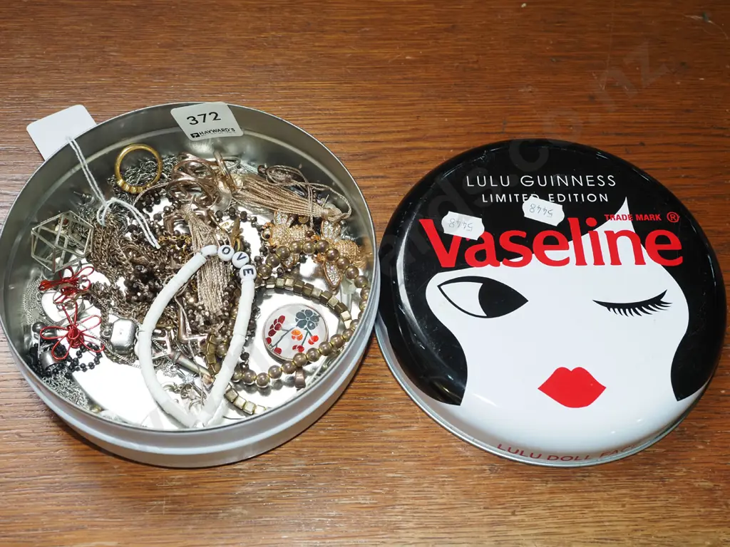 tin of costume jewellery Image 1++