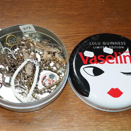 tin of costume jewellery