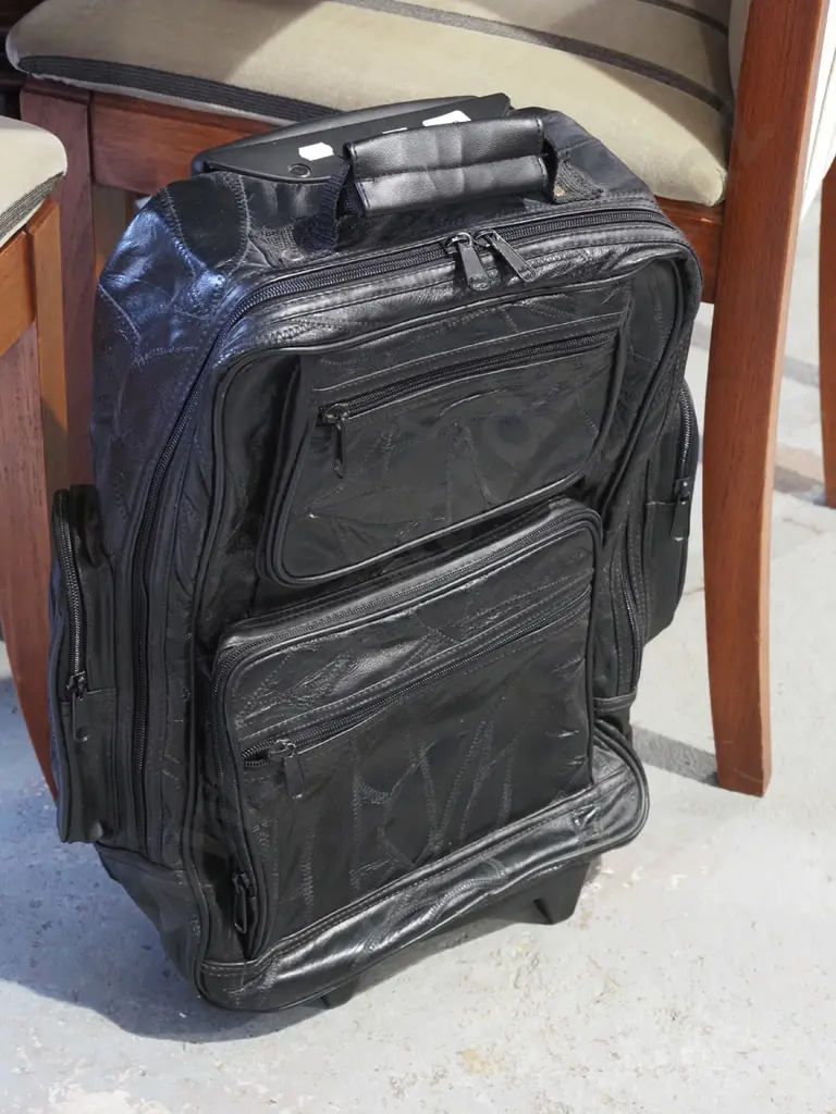 black vinyl carry on bag Image 1++