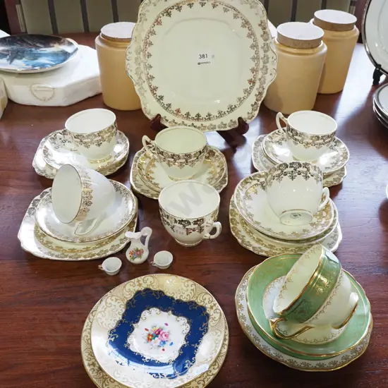 Royal Albert cream and gold cups, saucers, plate, mismatched cups, saucers and miniatures