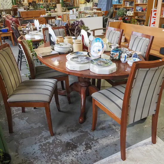 solid mahogany oval pedestal dining table with 6 matching upholstered chairs H750 W1800 D1200