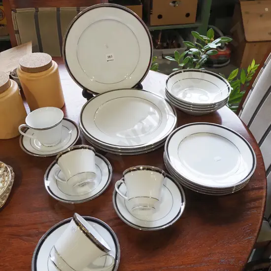 Noritake white, silver and black dinner items; plates, bowls etc