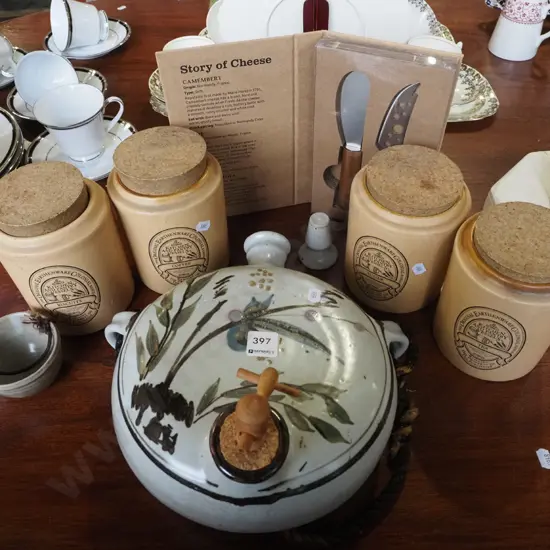 4x lidded canisters, cheese knives, pottery wall flask with spiggot and cup