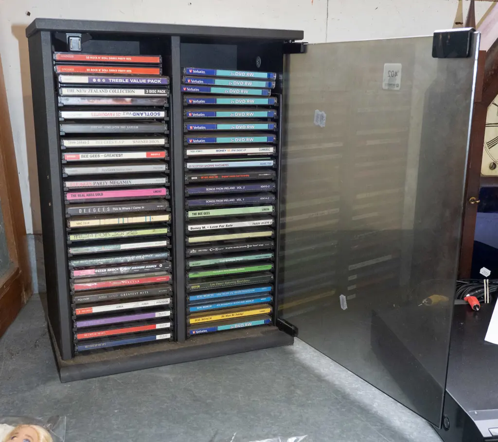 small CD cabinet and CDs H420 Image 1++