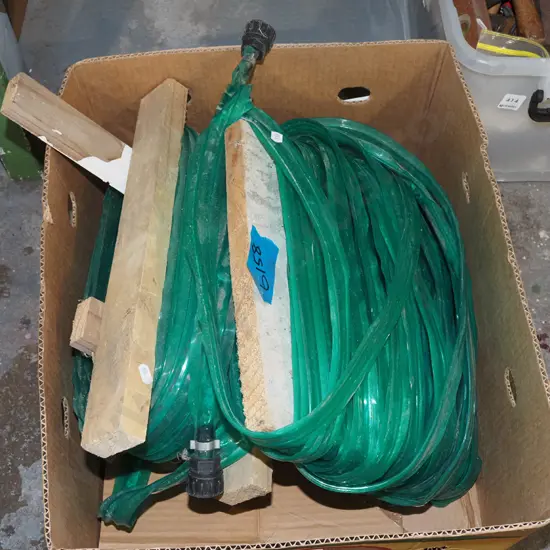 box; 2x green plastic dripper hoses