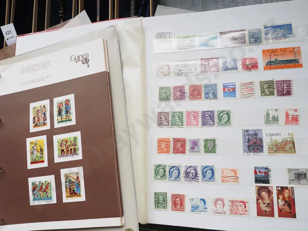 4x stamp albums Image 1++
