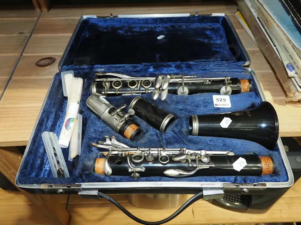 cased clarinet and sheet music Image 1++