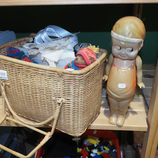 sewing basket and contents, celluloid doll