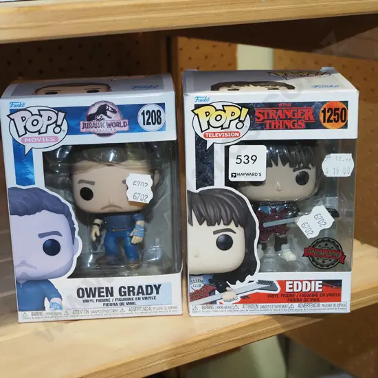 2x boxed Pop figurines; Owen Grady, Eddie - Grady box has fading