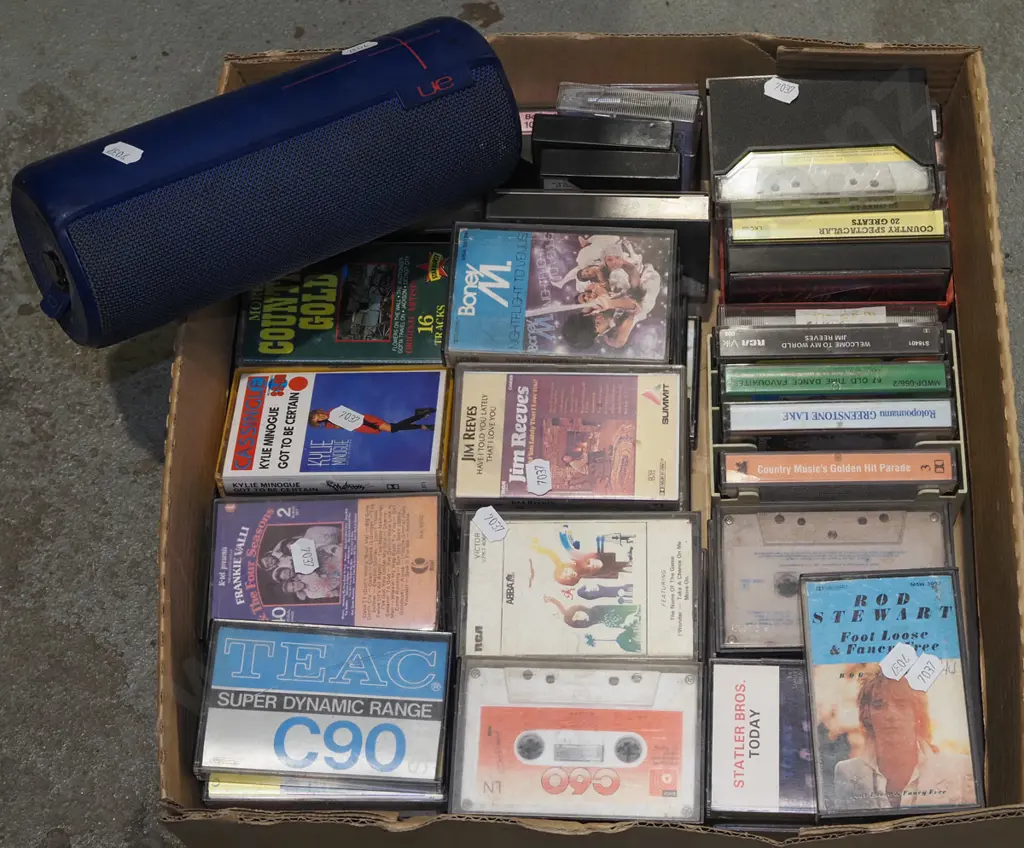 box of tape cassettes, UE Boom speaker Image 1++