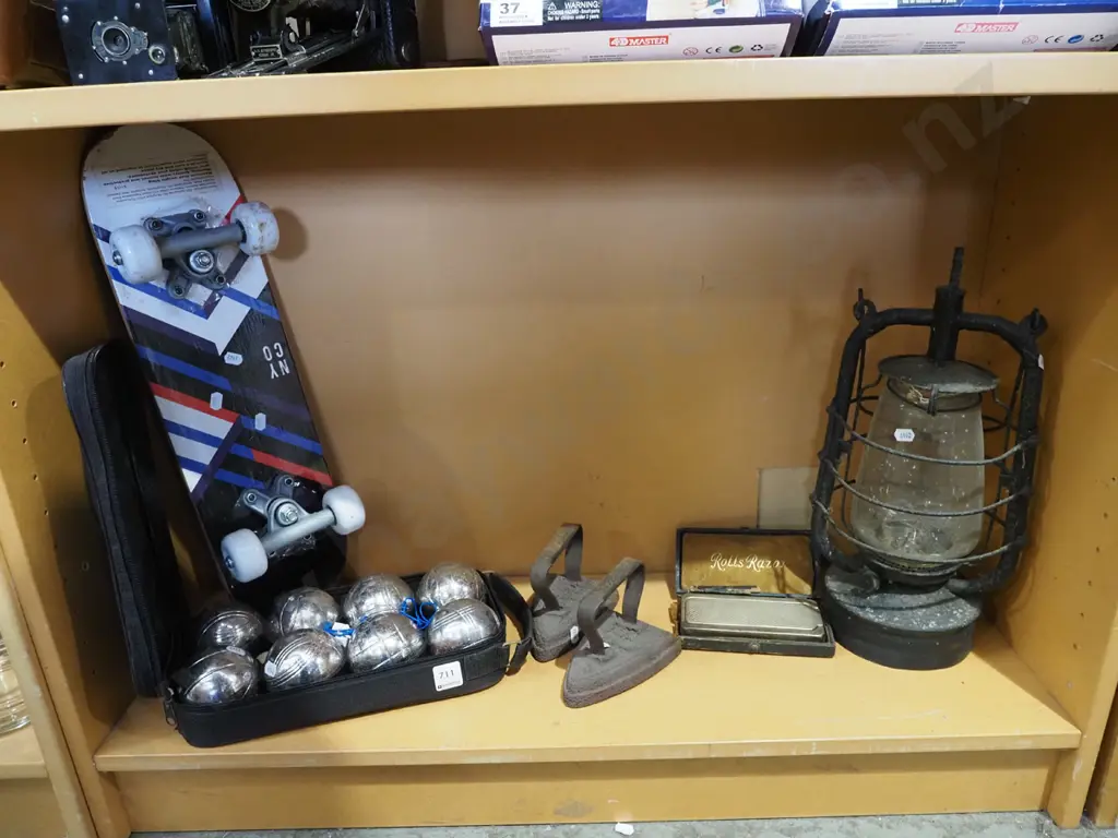 shelf; petanque set, skateboard, rolls razor etc Image 1++