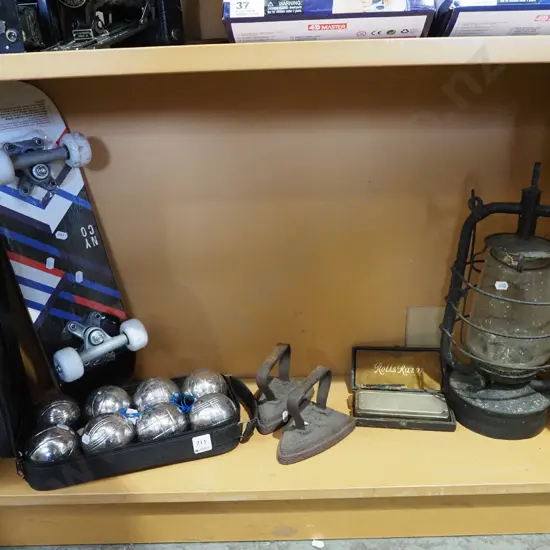 shelf; petanque set, skateboard, rolls razor etc