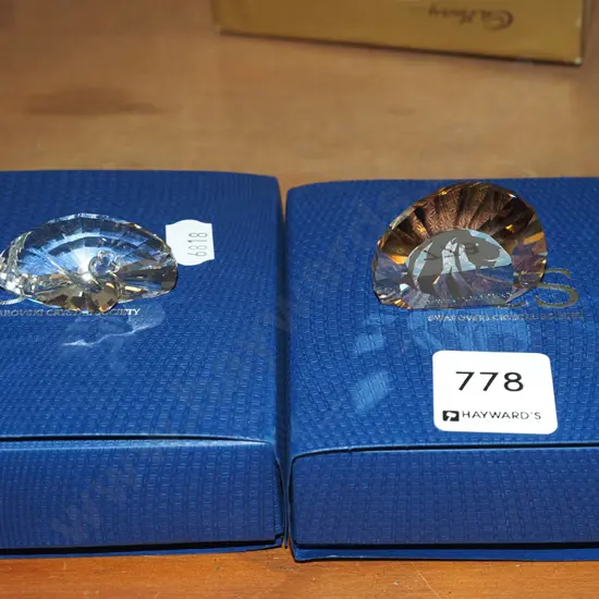 2x boxed Swarovski crystal ornaments - lion & swan on prisms