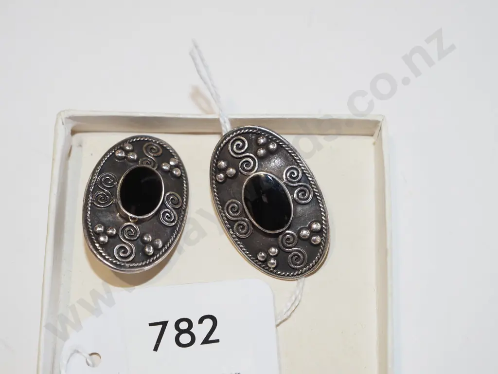 pair of sterling silver and black stone decorative earrings Image 1++