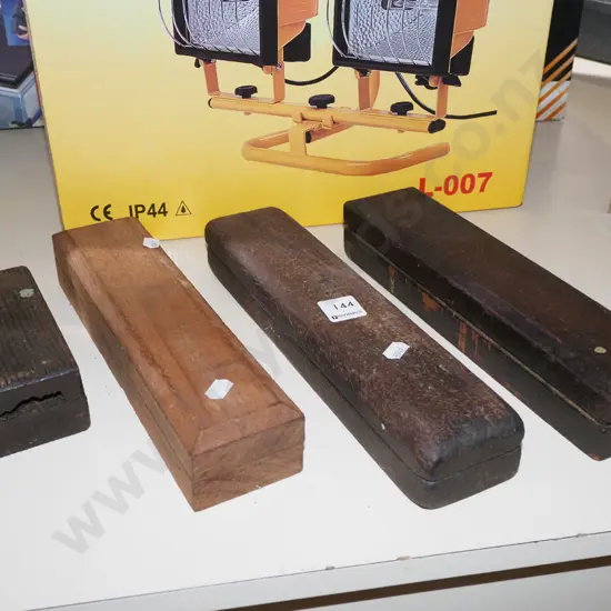 4x sharpening stones in wooden boxes