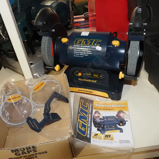 GMC bench top grinder with box of accessories