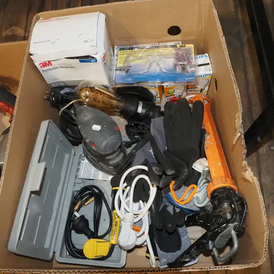 box; caulking gun, gloves, light bulbs, soldering iron etc