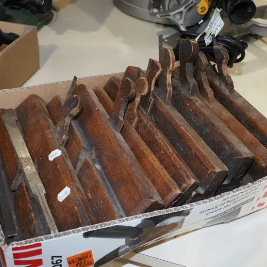 box of vintage moulding planes