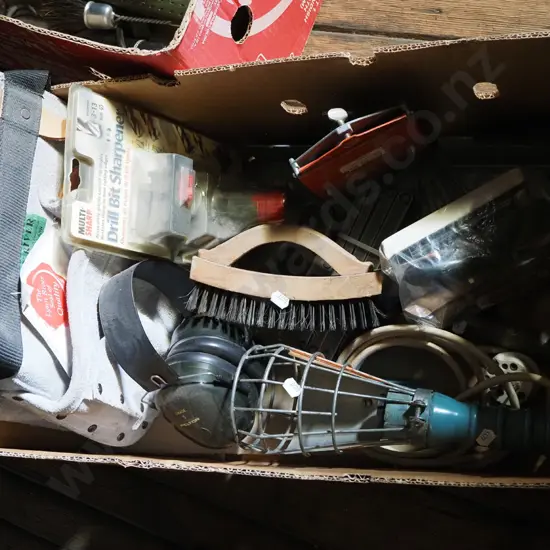 box; ear muffs, builder's belt, trouble light etc