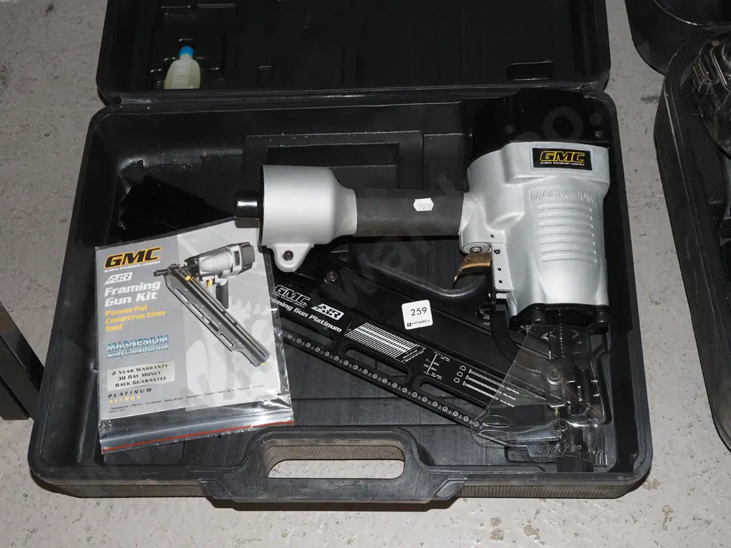 GMC air powered framing gun in plastic carry case Image 1++