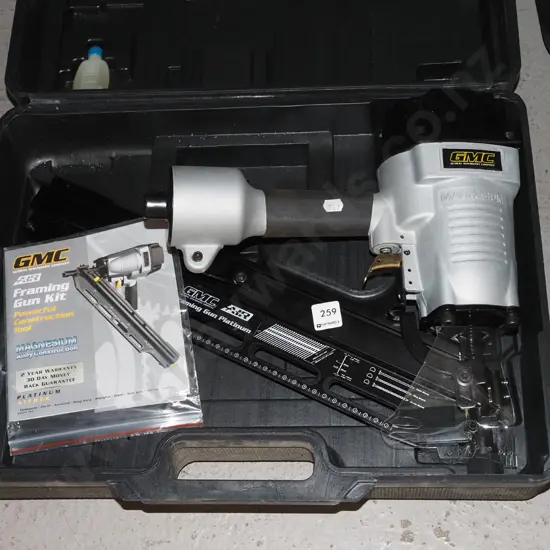 GMC air powered framing gun in plastic carry case