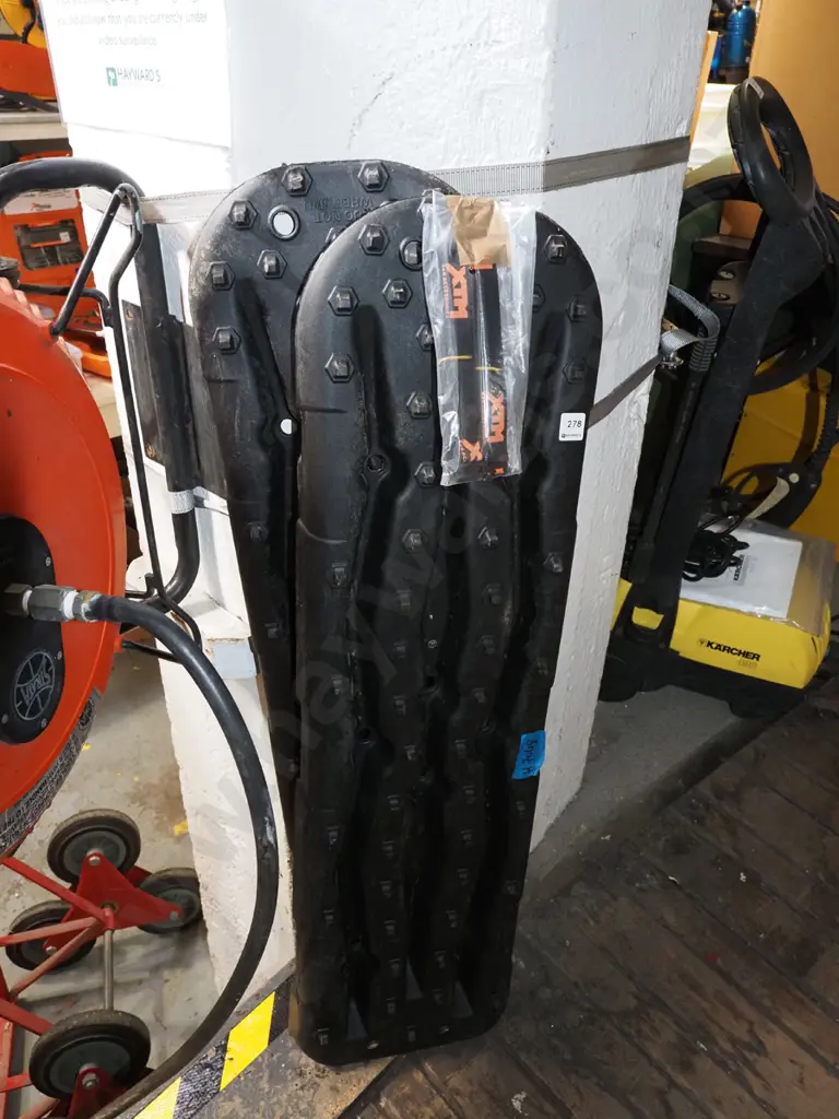 pair of black plastic off road recovery tracks Image 1++