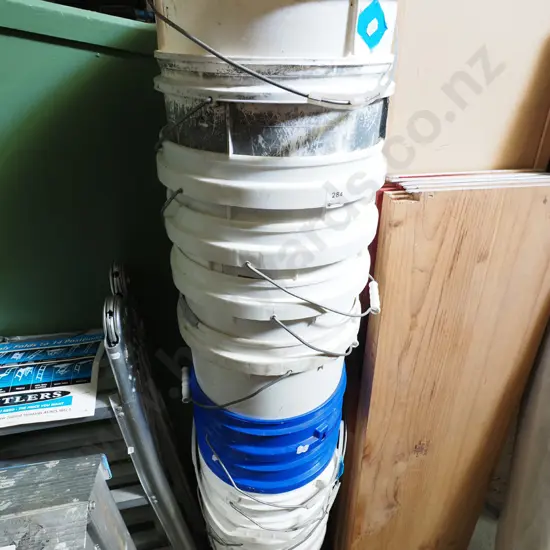 stack of plastic buckets