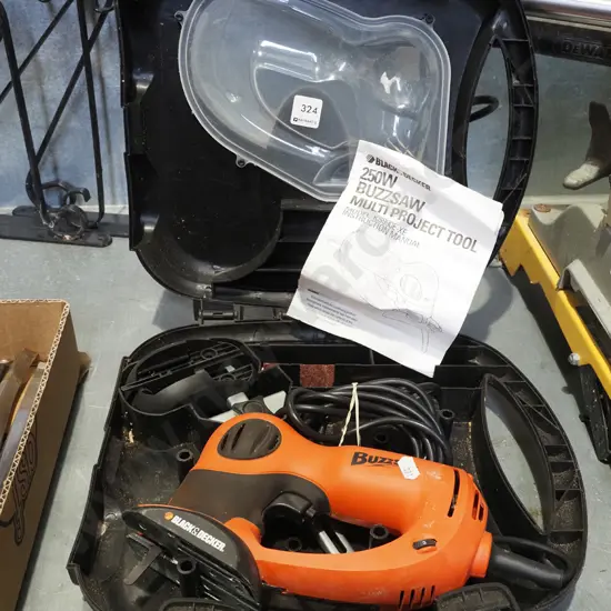 cased Black and Decker buzz saw multi project tool