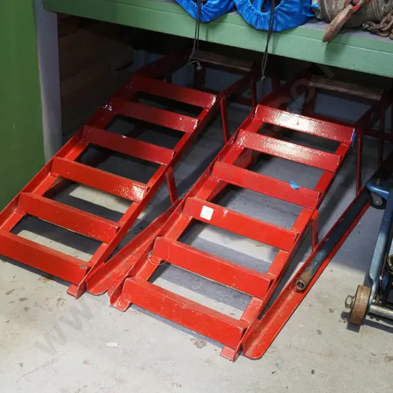 red metal car ramps