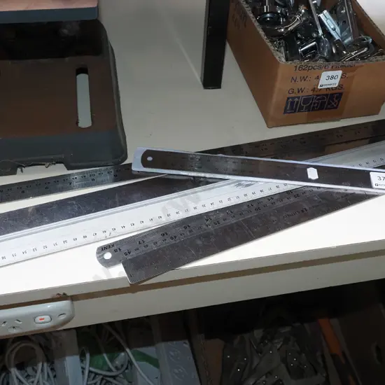 bundle of steel rulers