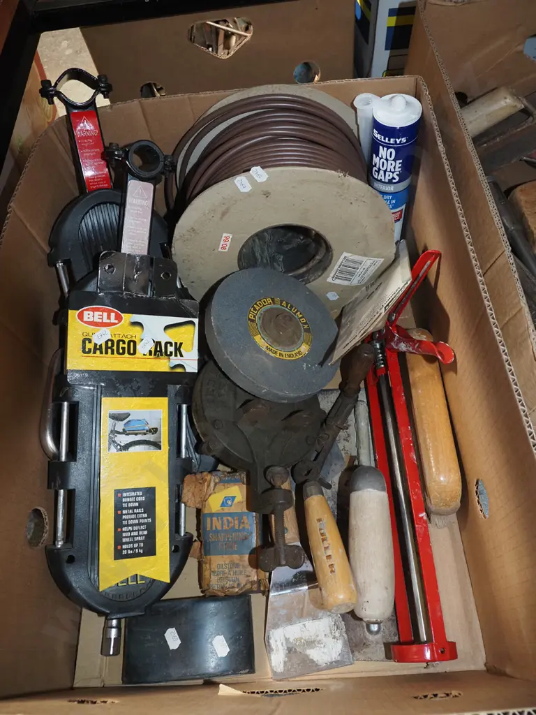 box; bike cargo racks, bench top hand crank sharpening stone, caulking gun etc Image 1++