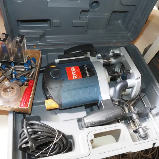 case Ryobi ERT 21 OOVK plunge router with small box of bits and accessories