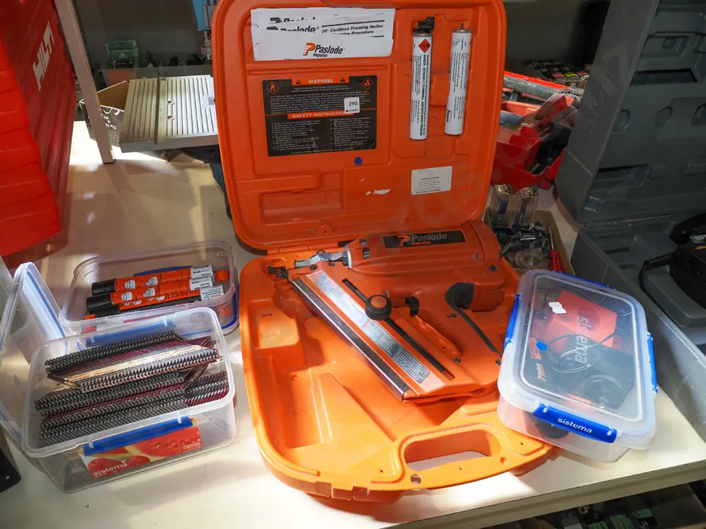 Paslode Impulse cased nail gun with nails, gas canister, batteries and charger Image 1++